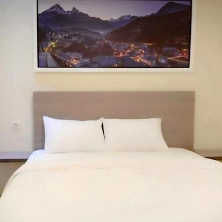Twospaces Living At Maximus Inn Palembang Exterior photo
