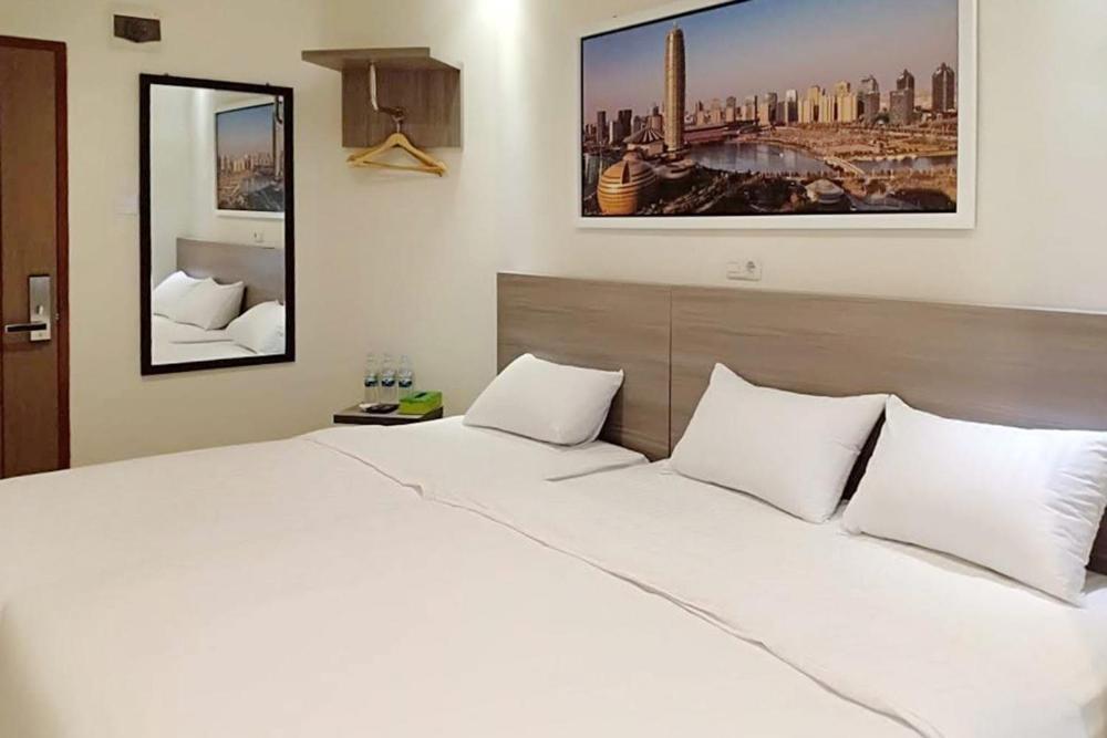 Twospaces Living At Maximus Inn Palembang Exterior photo